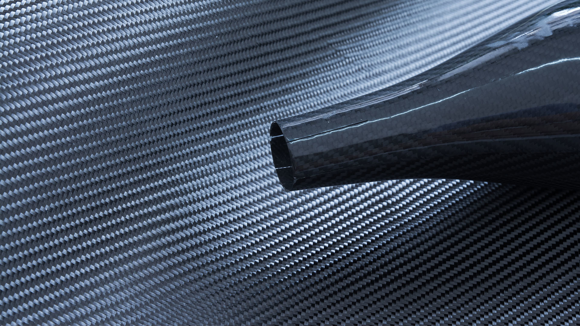 Woven carbon fiber sheet and fabric roll